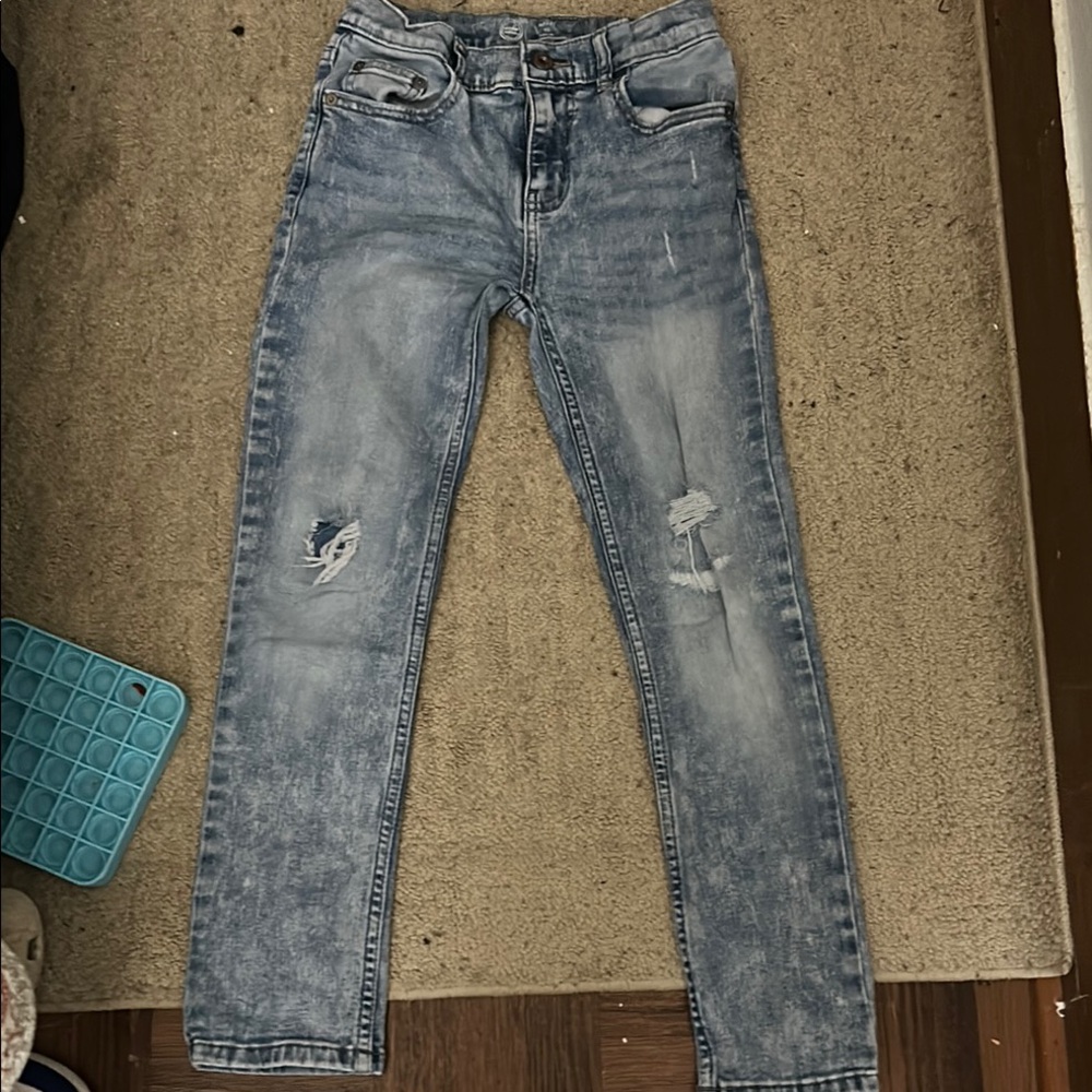 Distressed Blue Jeans